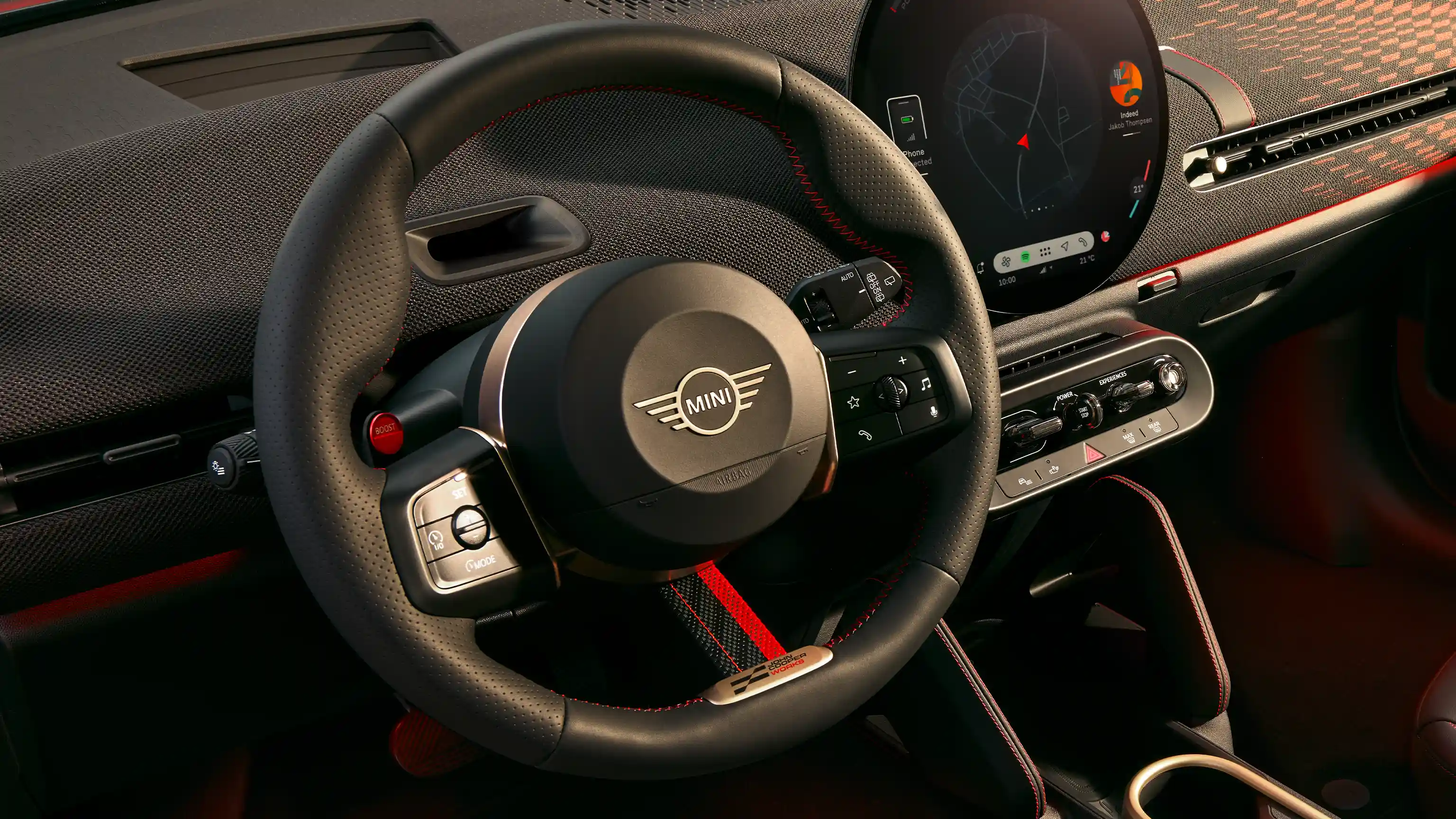 MINI John Cooper Works steering wheel with integrated controls and JCW detailing.